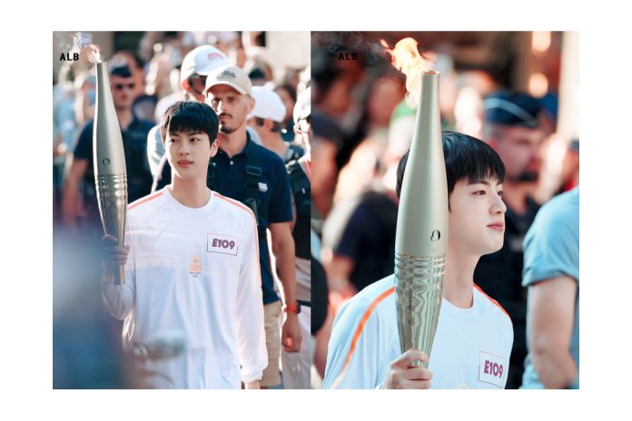 jin bts dengan gagahh membawa obor olimpade paris 2024