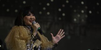 Ita Purnamasari dalam seuah konser